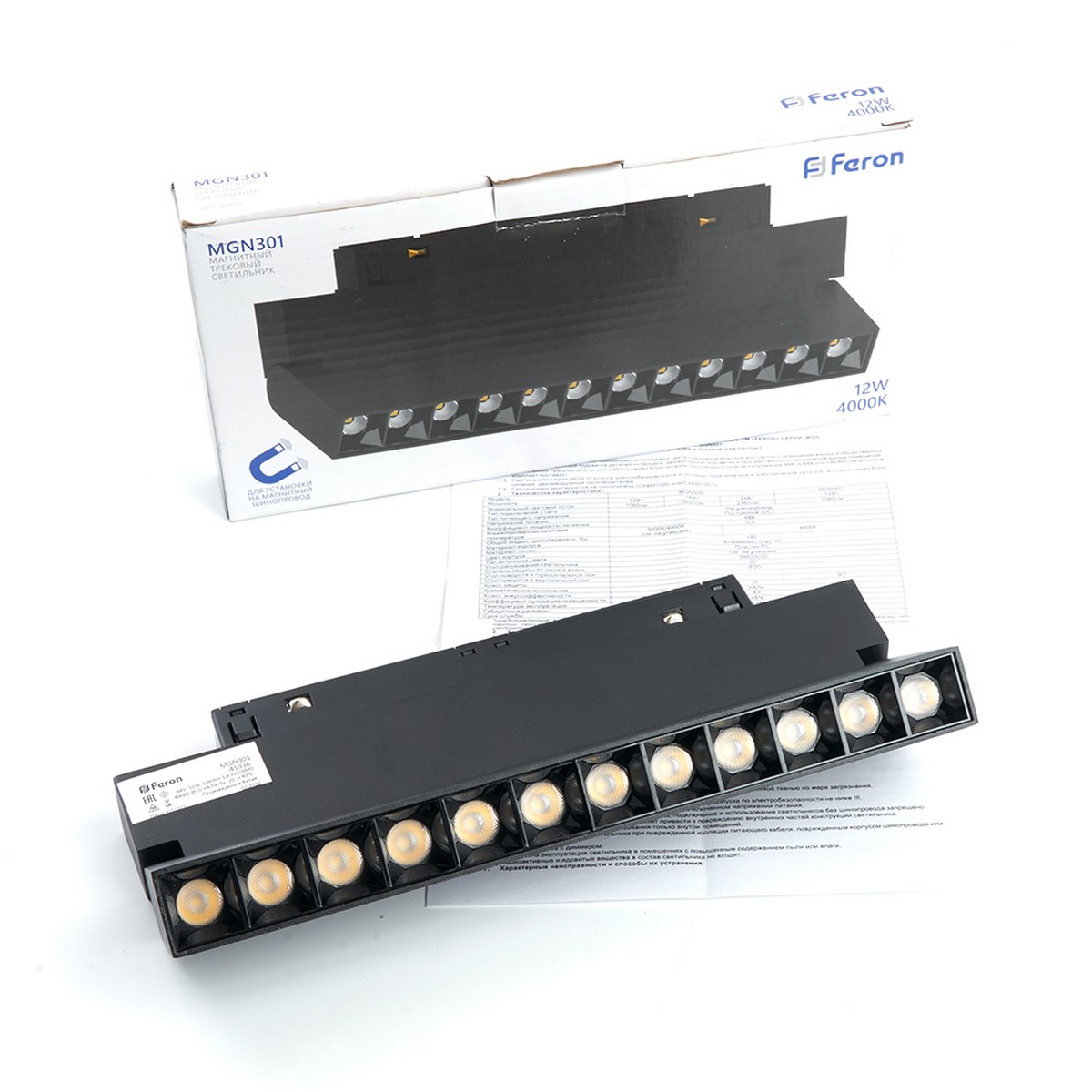 Трековые светодиодные светильники Светильник светодиодный Feron MGN301 трековый низковольтный 12W 2700К 30 гр черный LensFold 51015 