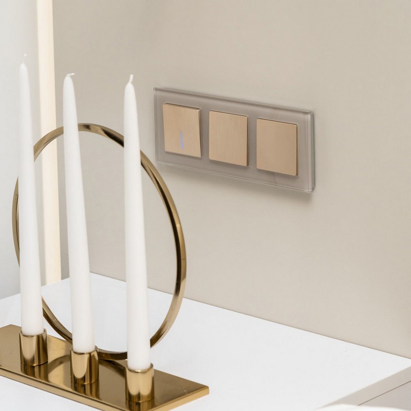 Werkel Шампань рифленный механизмы Выключатель Werkel одноклавишный  проходной с подсветкой (шампань рифленый) W1112110